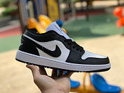 Air Jordan 1 Low Revisits The “Homage” Colorblocking In Black And White - 2