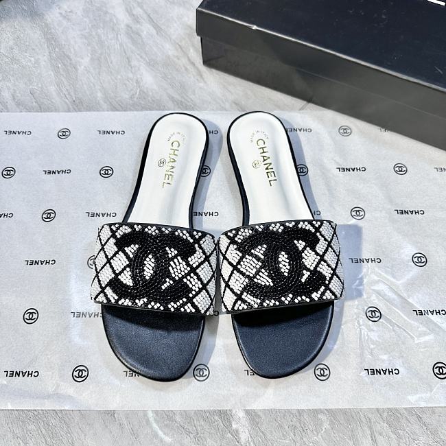 Chanel Chanel White/Black Quilted Pearl Embellished CC Flats - 1
