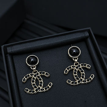 Chanel leather and black gold double C earrings