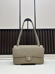CHANEL 2026 - Chanel Maxi Flapbag Grained Calfskin & Silver Metal Taupe Beige - 1