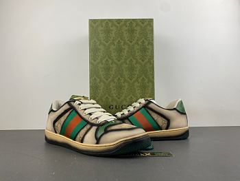 Gucci Men's serigraphy Screener trainer in dark blue and beige 848322 HVKI0 9666
