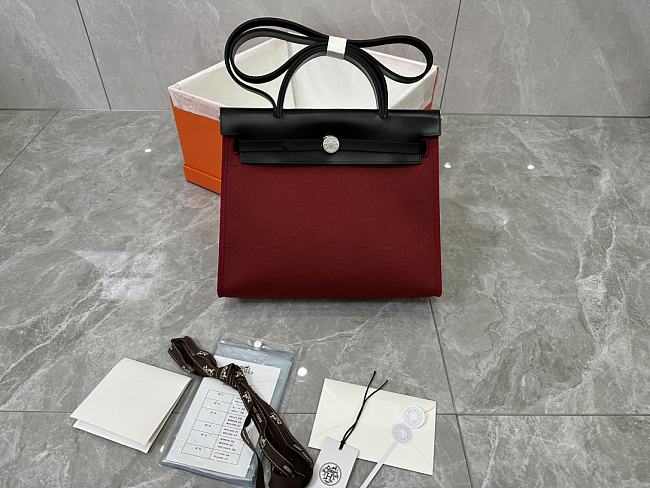 Hermes Military Toile Vache Hunter Herbag Zip Retourne 31 PM Rouge H Ebene Size 25x31x10cm - 1
