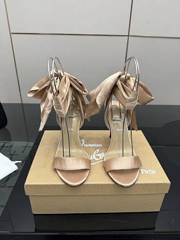 Christian Louboutin Strappy Heeled Sandals with Bow Ankle Tie Nude